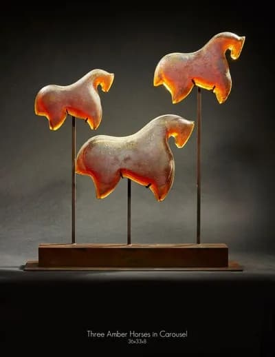 Marlene Rose, Amber Rose Carousel, 2012, sandcast glass and metal