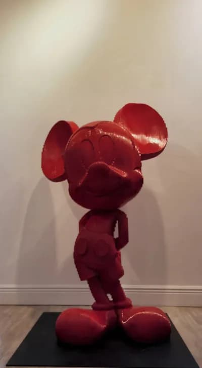 Daniele Fortuna, Mickey, 2022, carved wood, seen against a plain wall