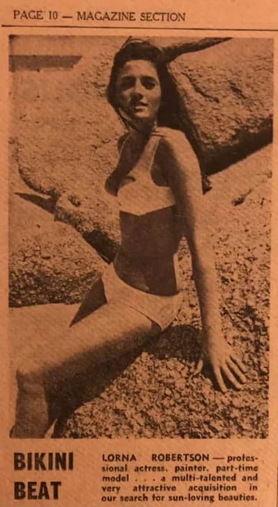 A newspaper magazine page headed Bikini Beat, with a photograph of a young woman on a rock and a caption naming Lorna Robertson as a professional actress, painter and part time model