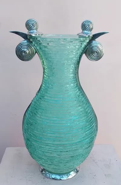 Apostol, Vase, 2022, chrome and hand cut glass, 22 by 13 by 11.5 inches