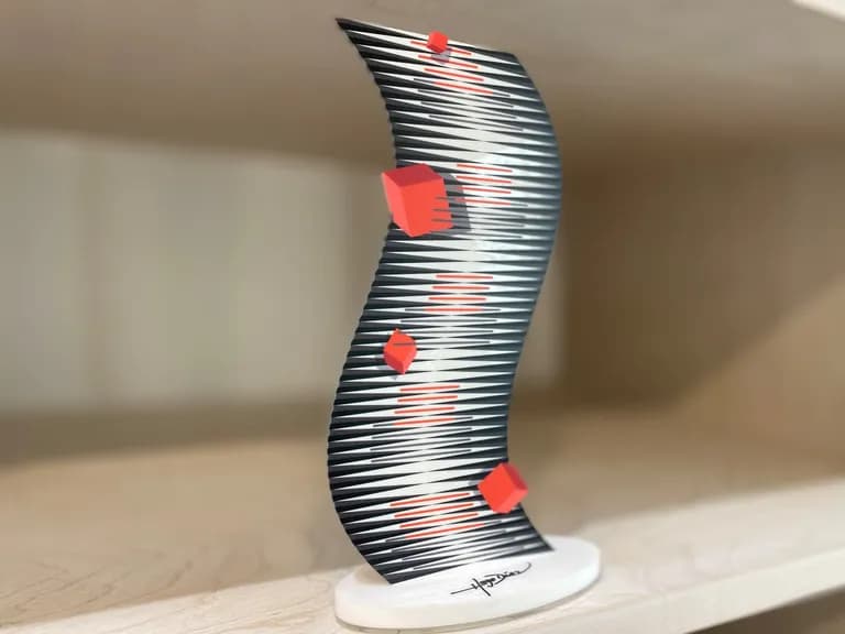 A curved plexiglass sculpture by Hugo Diaz striped in silver and pink, with red cubes on its face