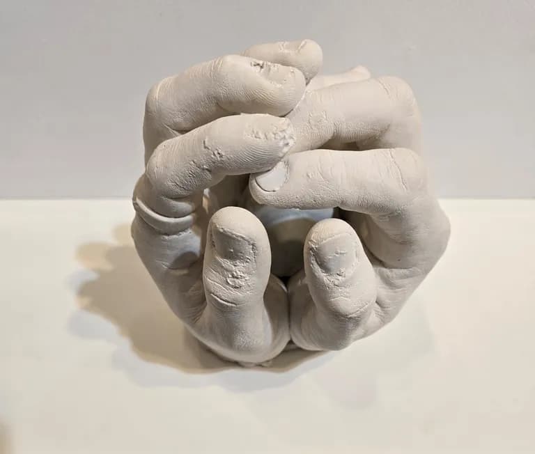 Paul Joseph White, a cast concrete closed fist