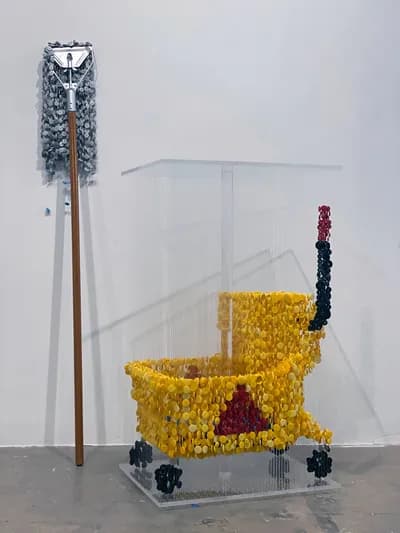 Mop and Mop Bucket Buttons were created by artist Augusto Esquivel, reflecting the growing trend of environmental activists staging bold stunts at art museums worldwide to draw attention to the climate crisis