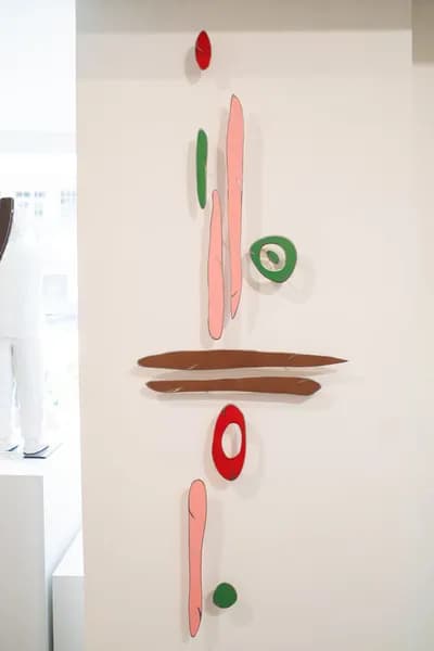 Carolina Sardi, U Me Us 2, painted steel, seen on the wall of a room