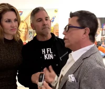 Elena and Grant Cardone with Aldo Castillo.