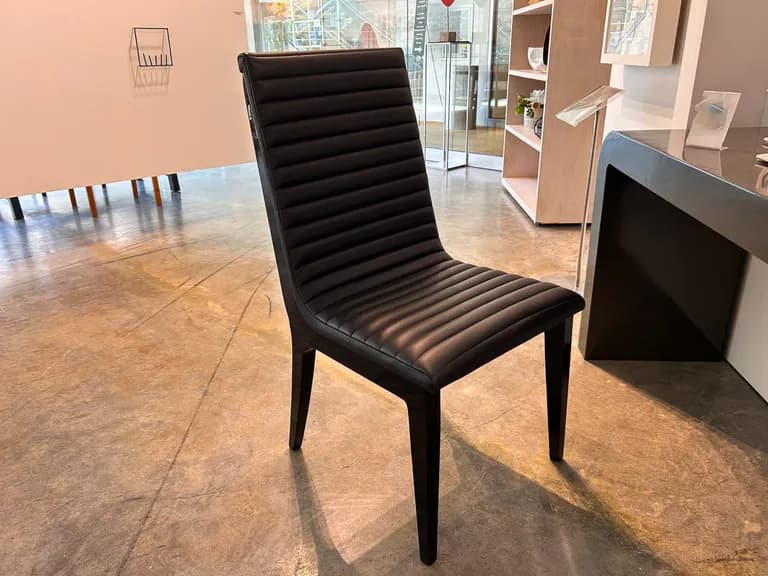 Black Leather Chair, Stainless Steel in Back 41h x 21w x 25L In