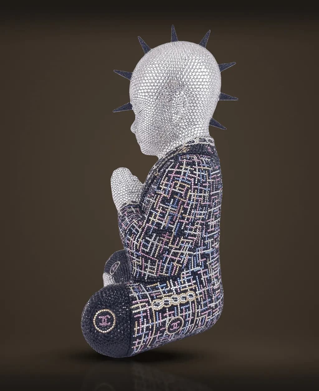 Metis Atash, Mademoiselle Chanel, in profile, black crystal spikes ringing the head
